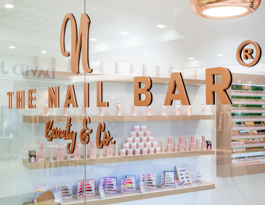 The Nail Bar salon entrance and retail display